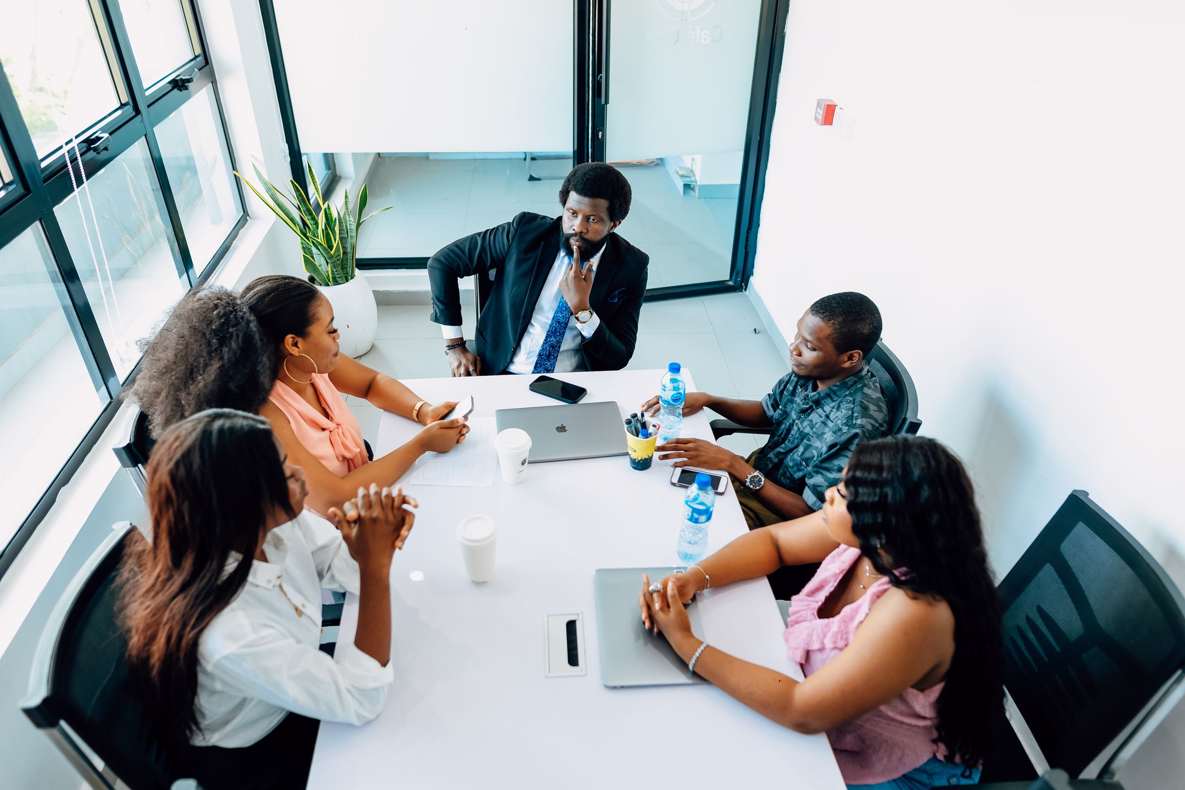 Black African executives in a formal business meeting